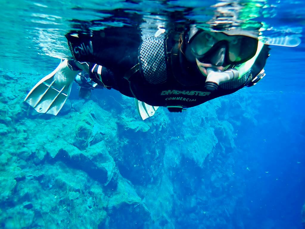 woman snorkeling the Siflra Fissure