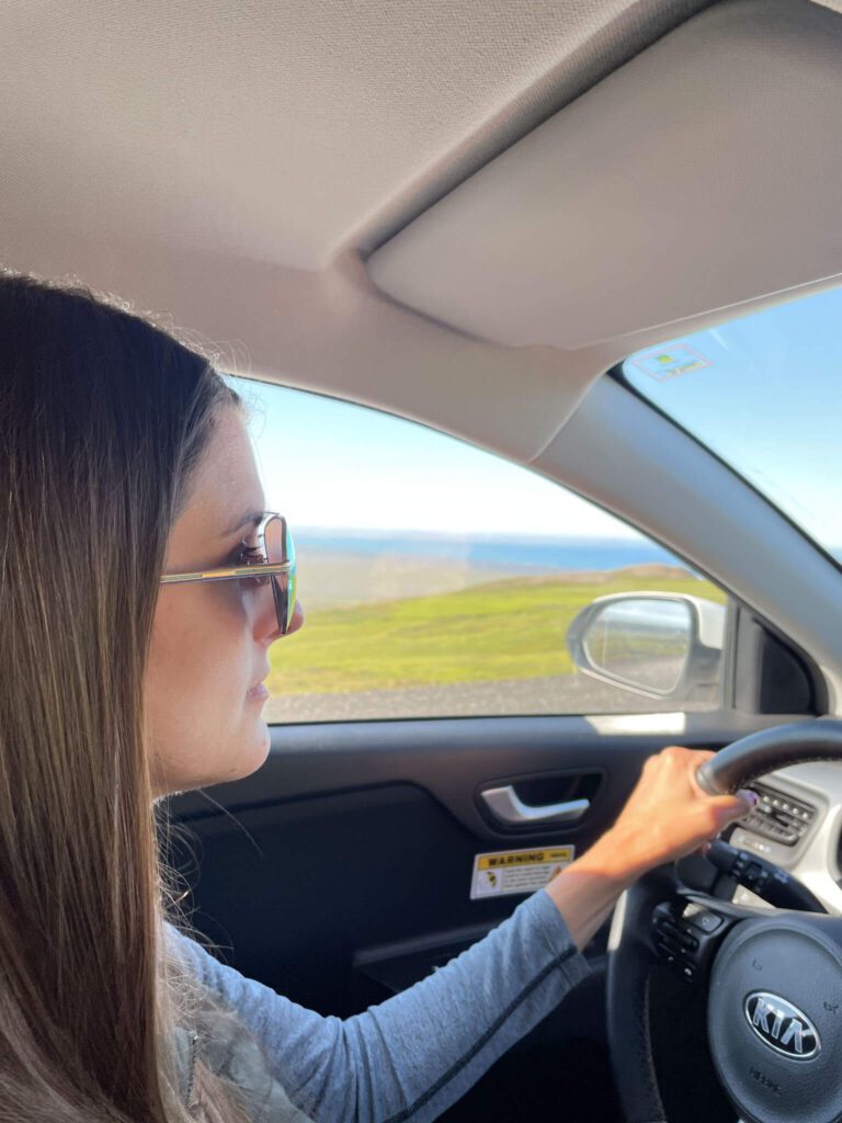 woman driving in Iceland
