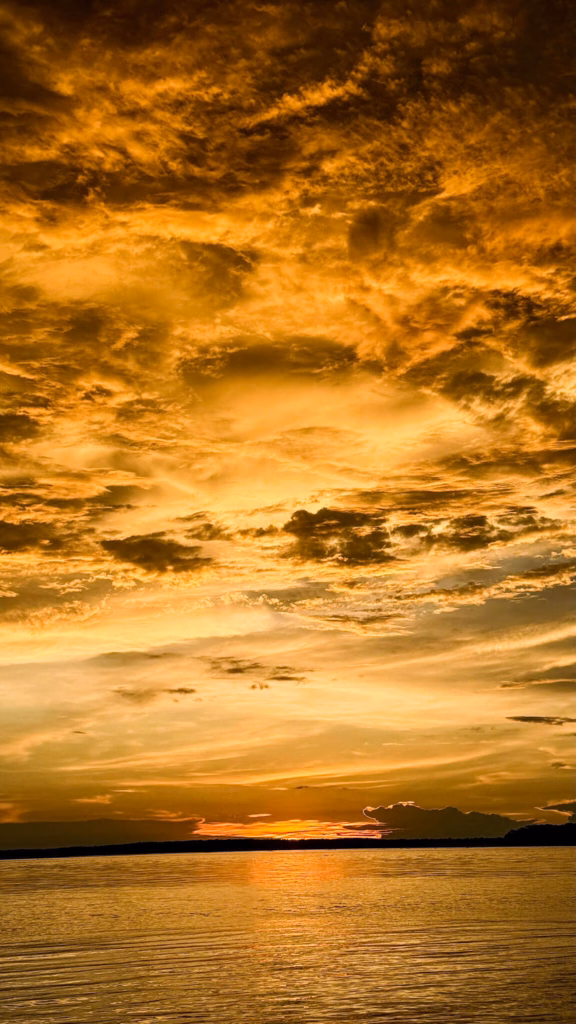 sunset over the Amazon river
